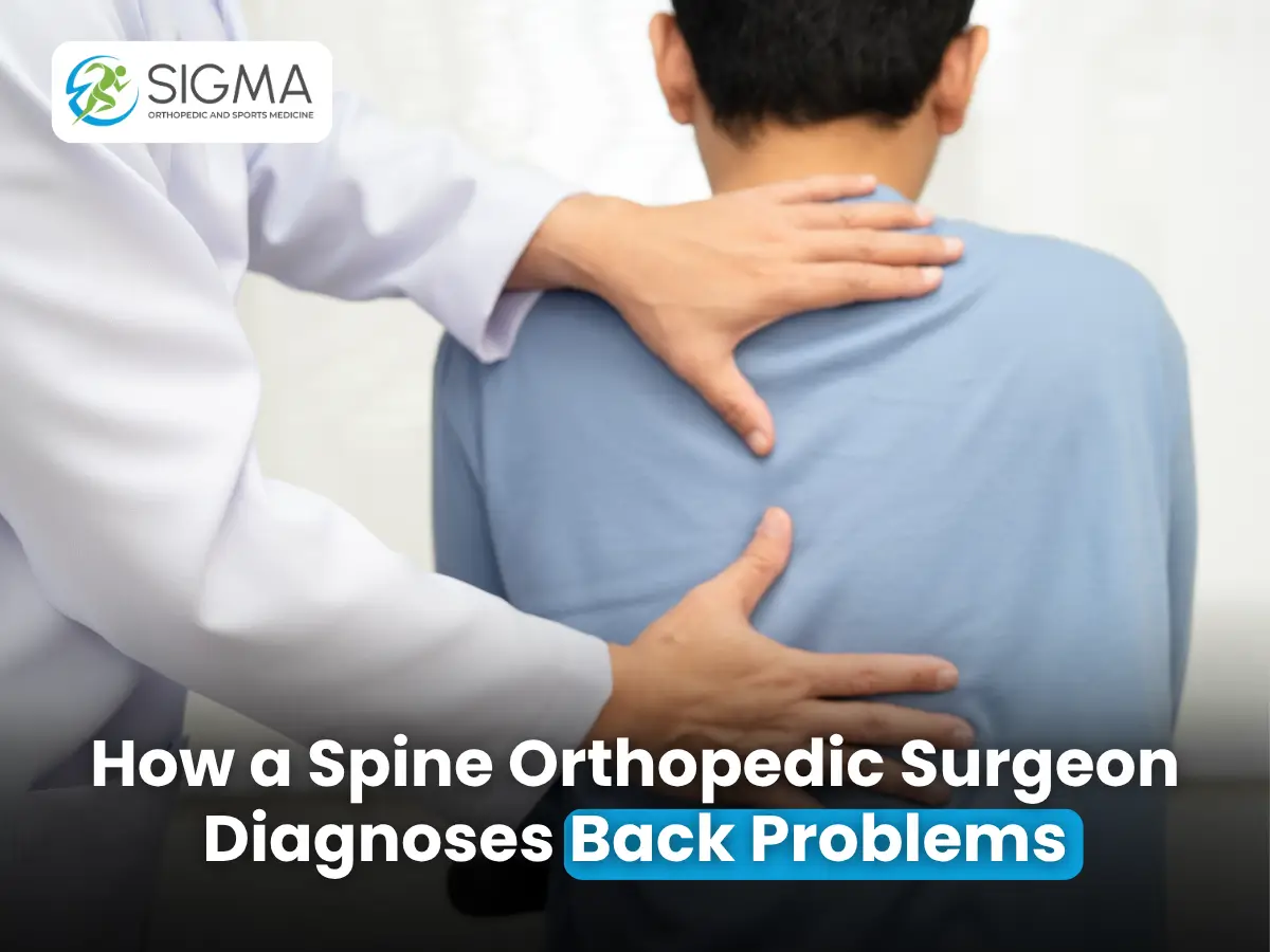 Orthopedic surgeon examining a patient's back.