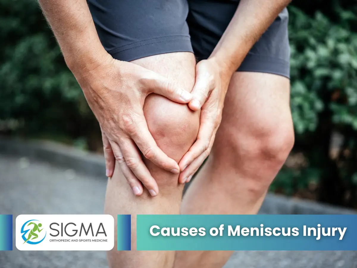 Person holding knee in pain due to meniscus injury causes
