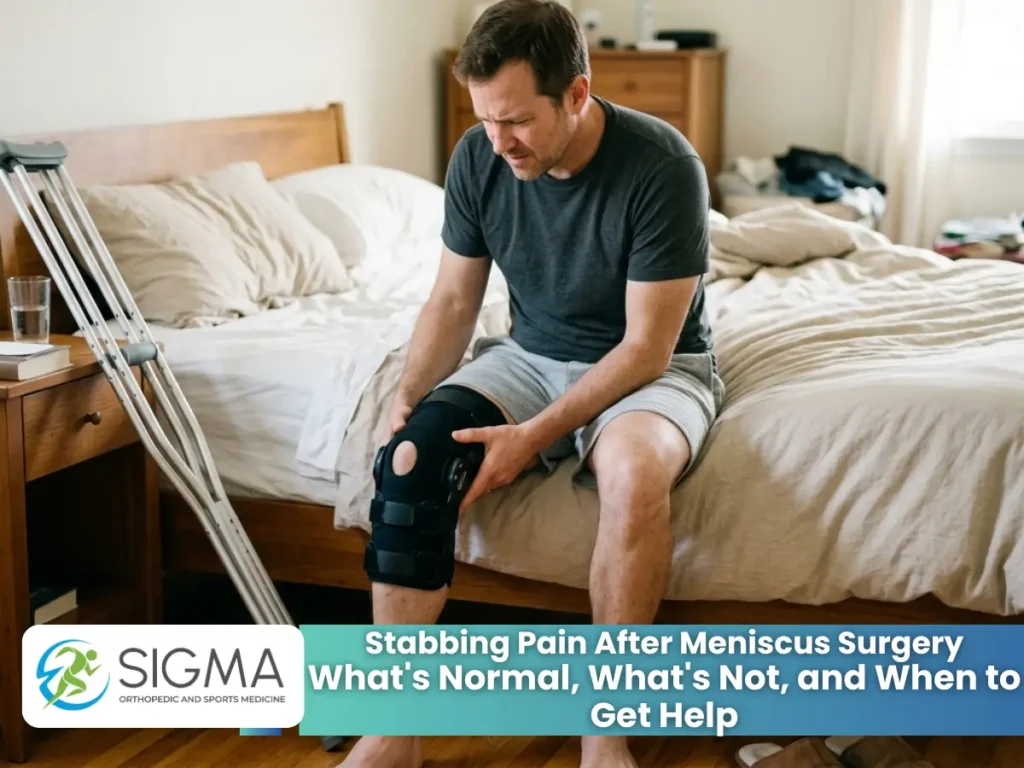 Man sitting on bed holding his knee in a black brace after meniscus surgery.